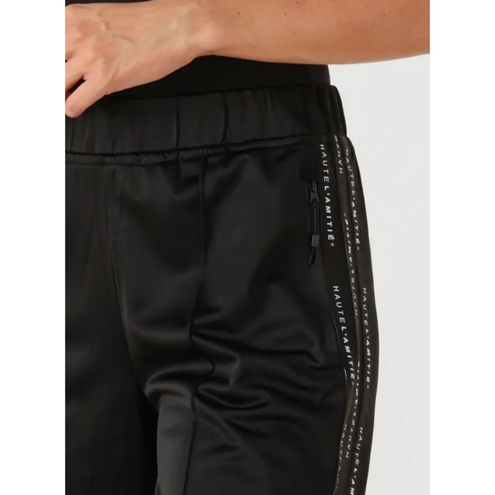 DAMES Haute L'Amitié Broeken^Dames Broeken Logo Tape Track Tall Pant