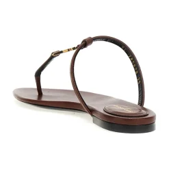 DAMES Saint Laurent Slippers^Leren platte sandalen met YSL-logo