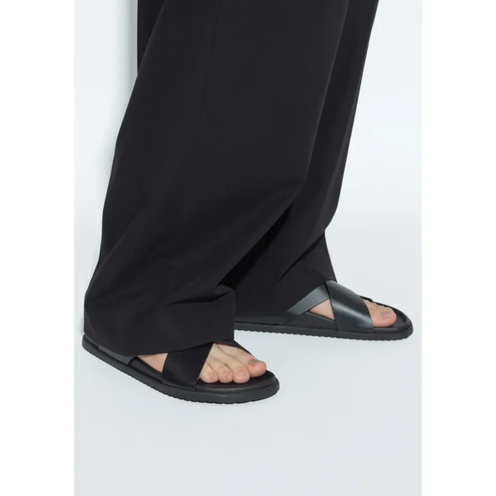 Heren Dolce & Gabbana Slippers^Leren slippers met logo-vormige applicatie