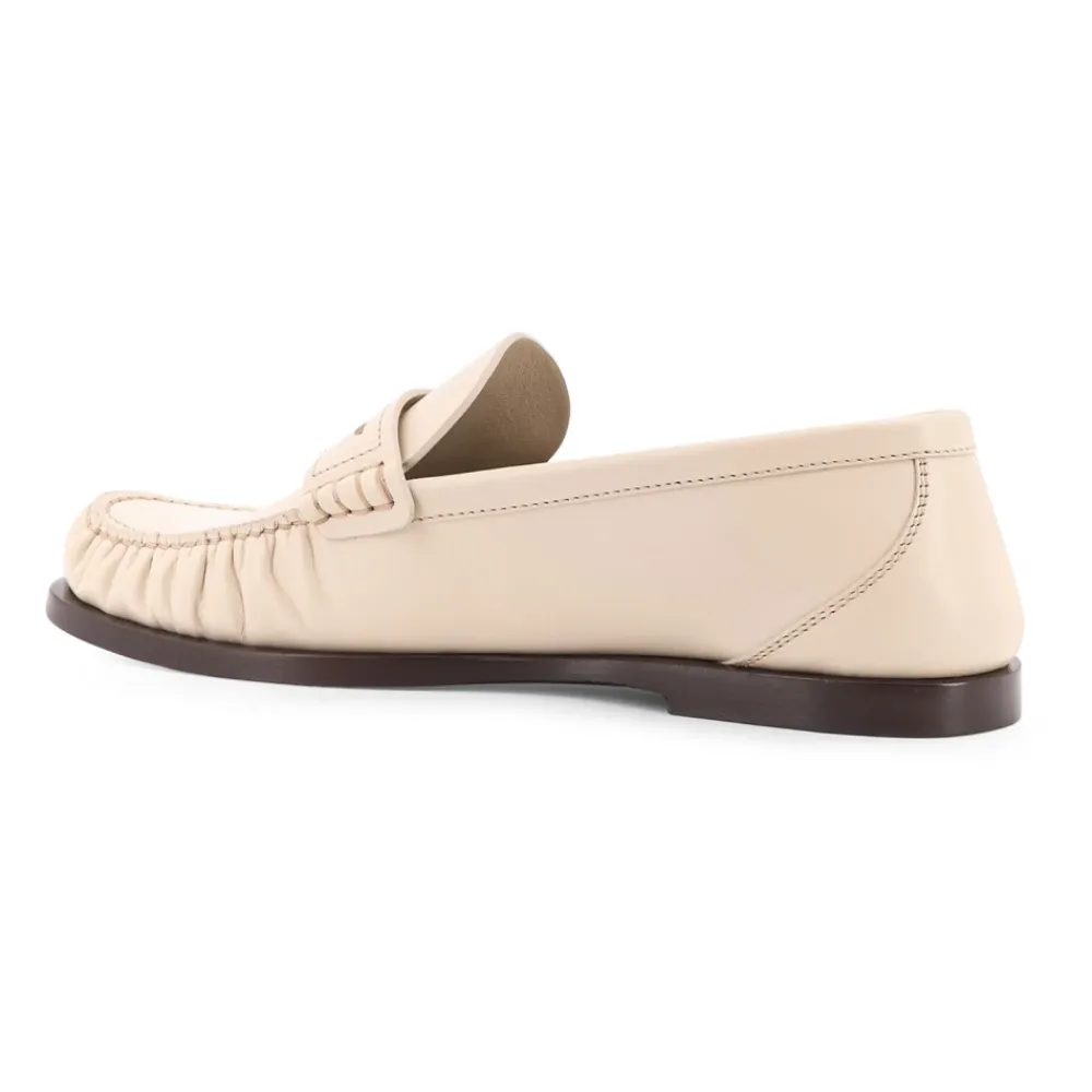 DAMES Saint Laurent Witte platte schoenen met iconisch monogram