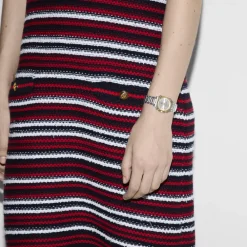 DAMES Gucci YA166503 - G-Flat 24mm roestvrijstalen kast met 18kt geelgoud vergulde lunet en schroeven; Zilver gegalvaniseerde wijzerplaat met Romeinse indexen om 12 en 6 uur en diamantindexen; Roestvrijstalen armband